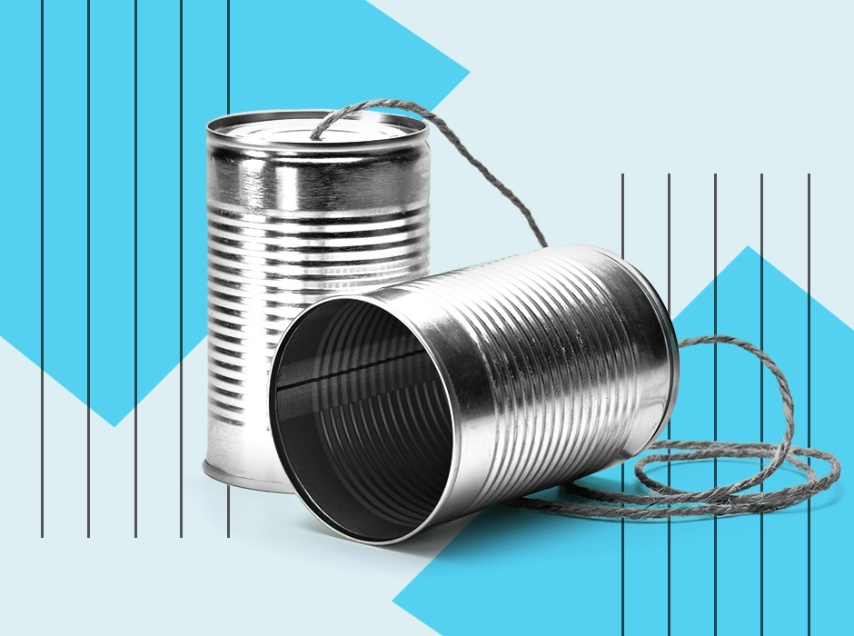 Two Tin Cans Tied Together With String Over Blue Background